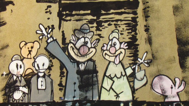 This mural, painted high up on the side of an old building, is meant to depict the royal family. I don't know if it's offensive to them, but personally, I think it rocks!